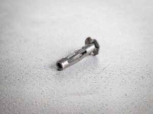 Metall-Hohlraumdübel mit Spreizlamellen für Gipskartonplatten — Stanzbiegeteil aus der Befestigungstechnik · Biegema
